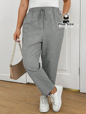 Calças Cintura Elástica e Bolsos Diagonais Xadrez Plus Size Várias G / Preto e Branco Calças Cintura Elástica e Bolsos