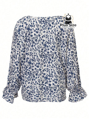 Camisa Floral Plus Size Decote V com Cordão Camisa Floral Plus Size Decote V com Cordão